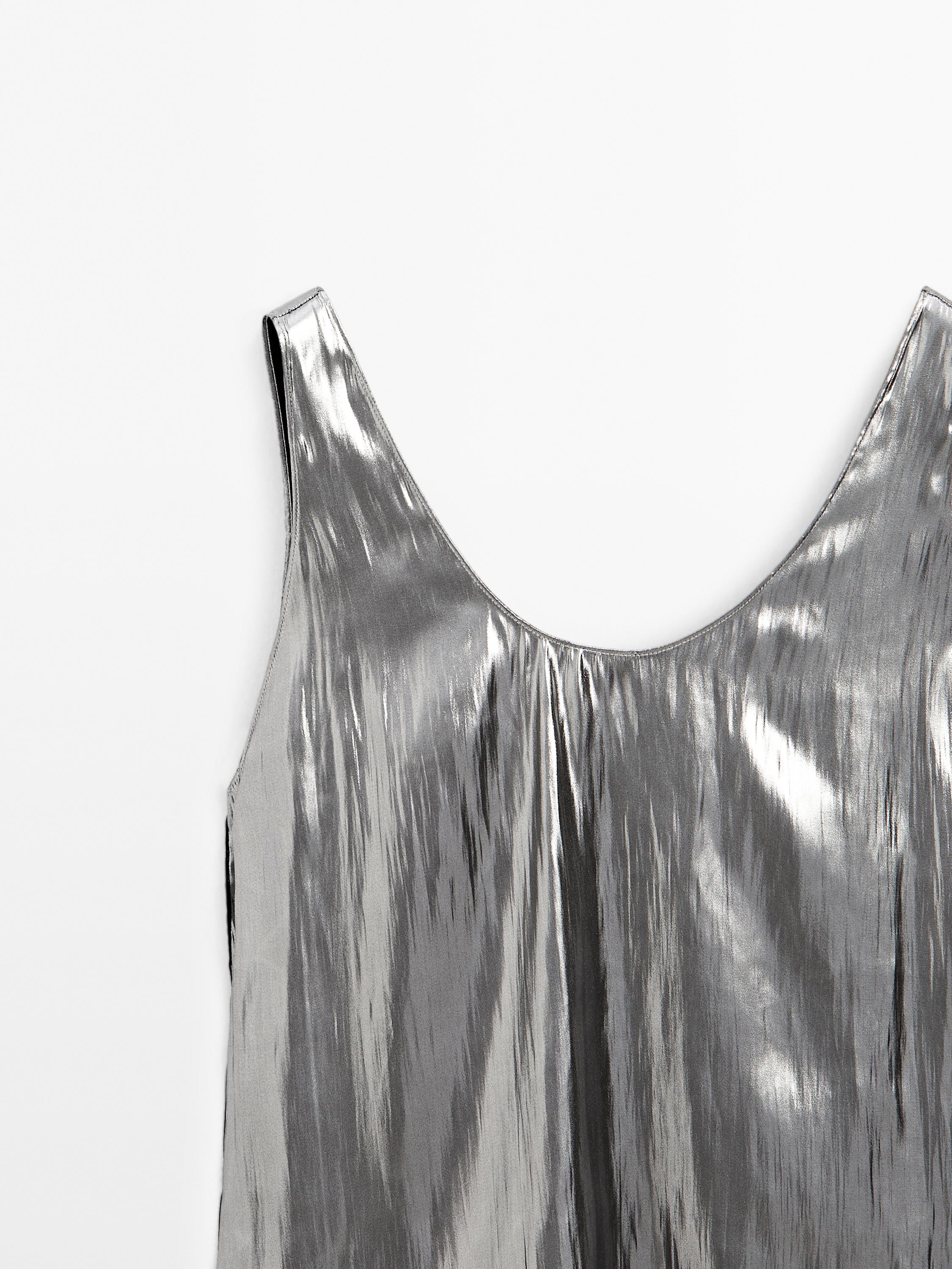 Flowing metallic strappy top